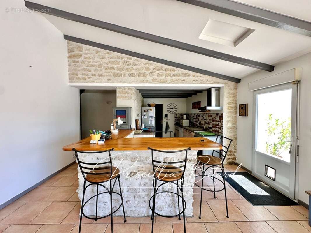 Le charme d'un environnement verdoyant allié au confort d'une maison familiale - photo 5