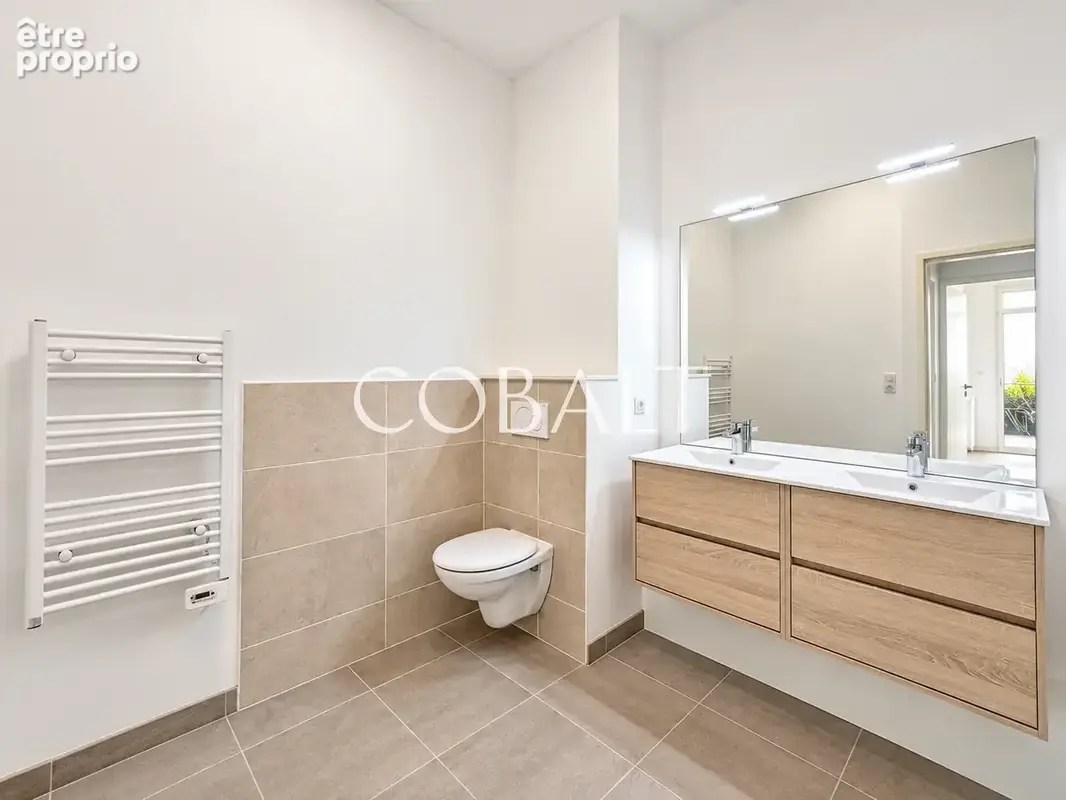 Appartement - 98 m2 - 3 chambres - Rez-de-jardin - double garage - Secteur Bonne Source - photo 7