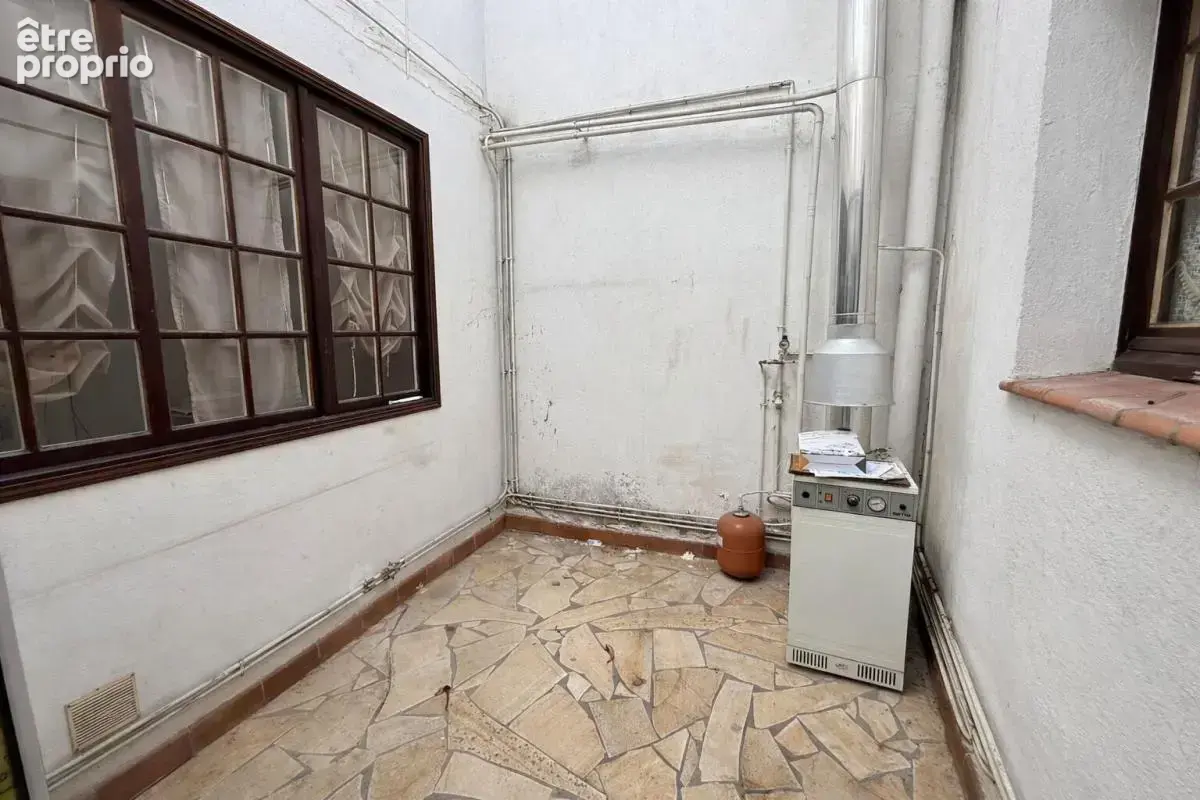 Grande maison de village type 8 à rénover avec garage, patio et volumes généreux à Trèbes - photo 3