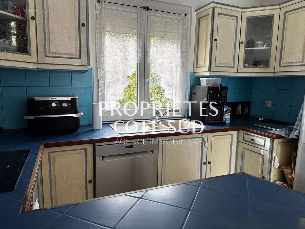 Maison à LAUDUN-L'ARDOISE