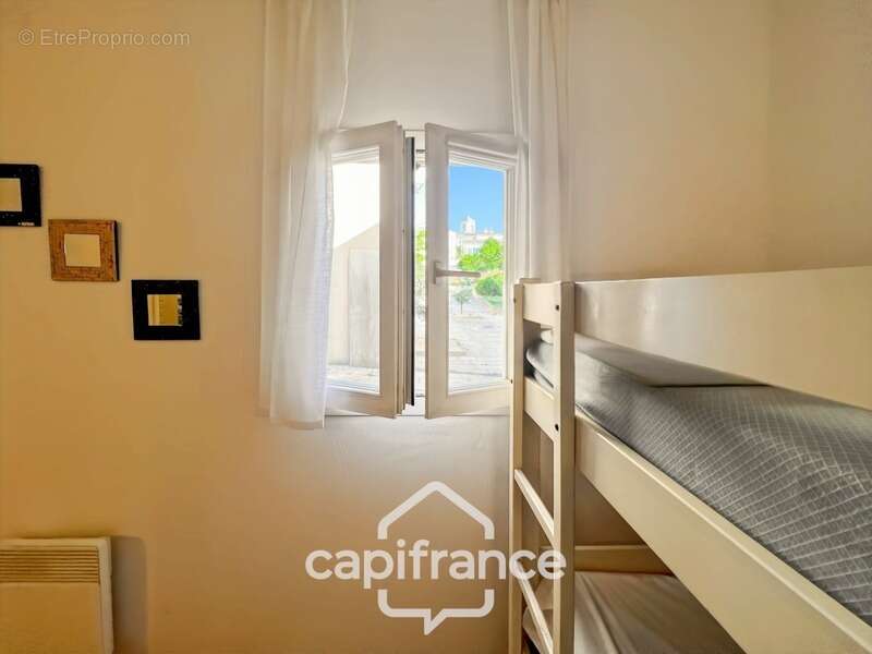 appartement REZ de JARDIN,résidence du lac, 31 m2, chambre ouverte, grande salle de douche, rangements, cave collective - photo 22