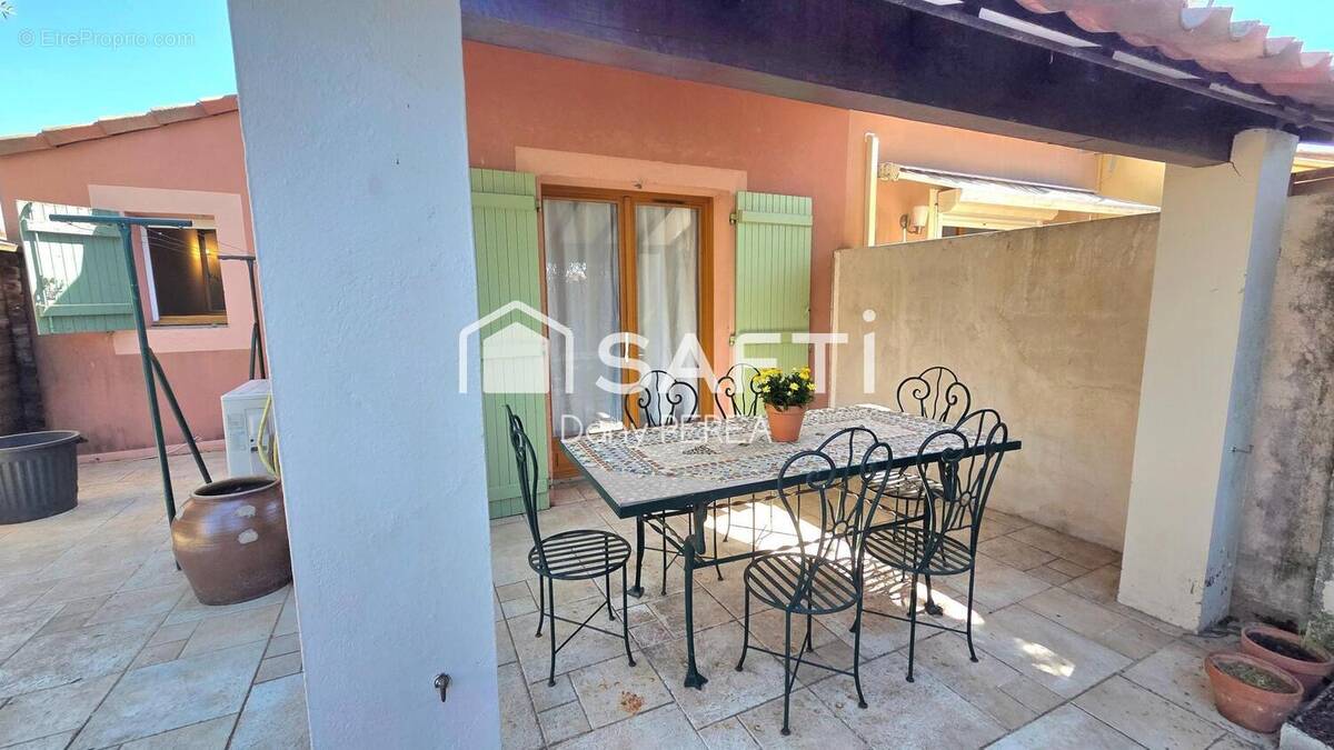 Photo 1 - Maison à SAINT-LAURENT-D'AIGOUZE