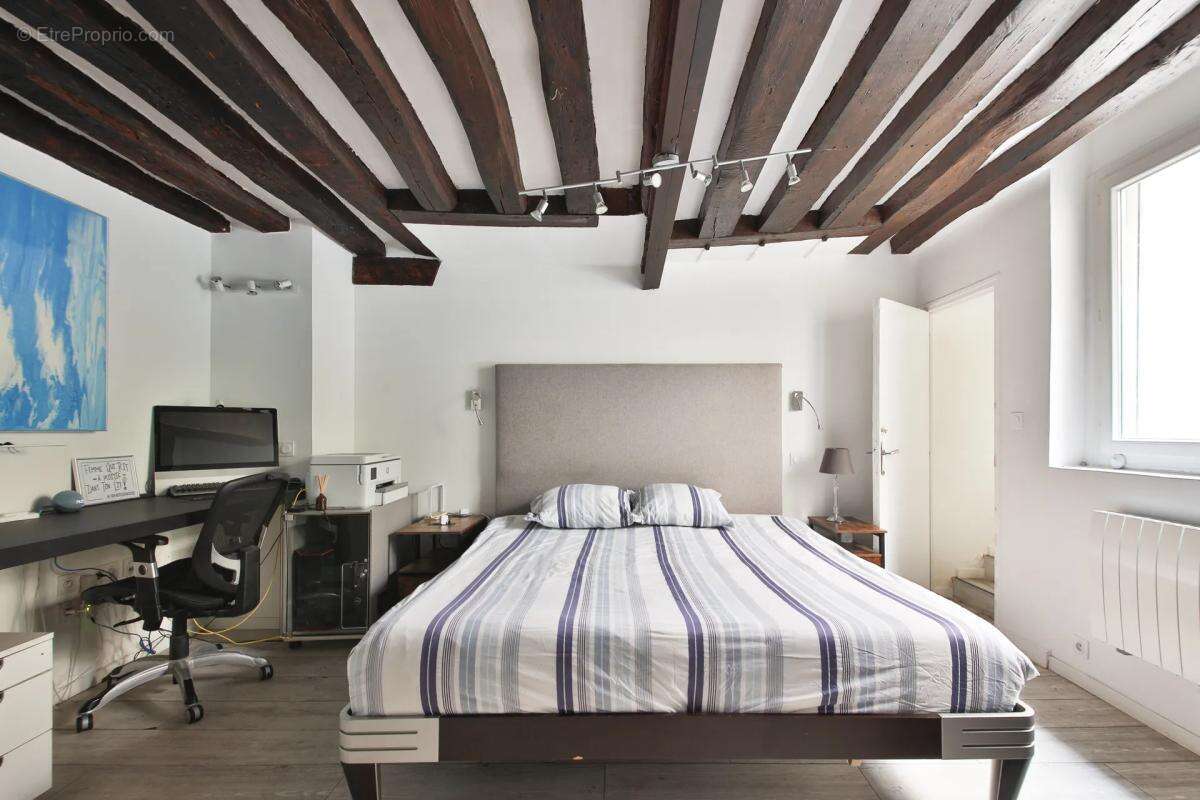 Loft 87 m² Paris 4e - Charme et lumière - photo 8