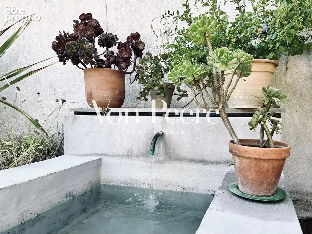 Maison contemporaine rénovée avec bassin fontaine - photo 26
