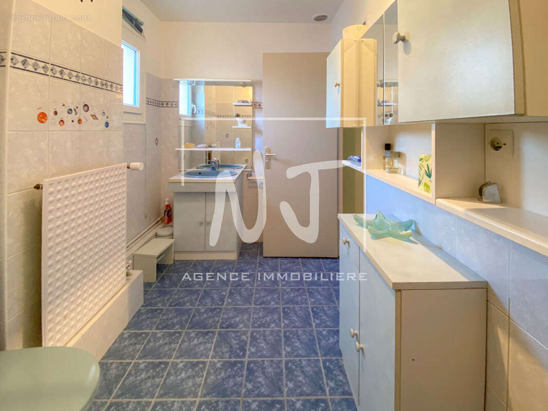 Maison à SAINT-BARTHELEMY-D'ANJOU