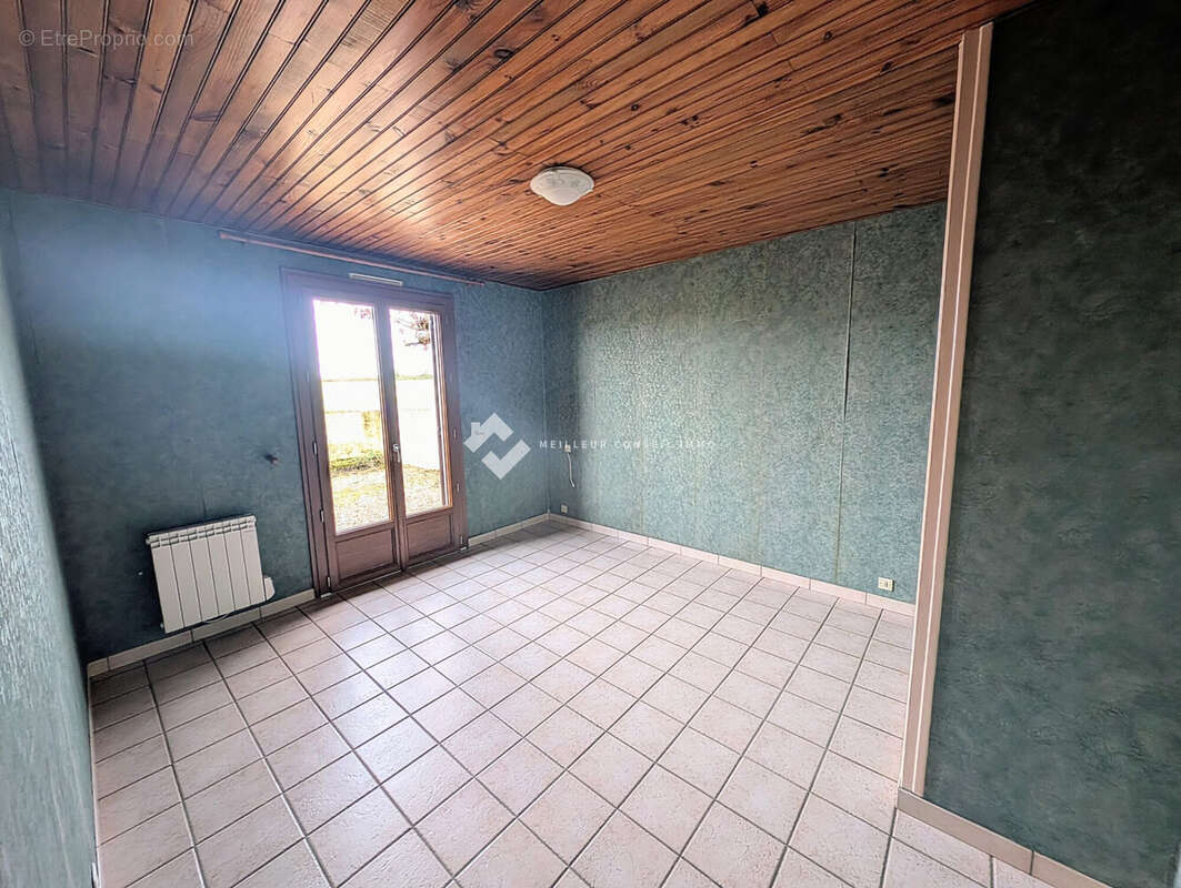 Maison 108 m² à Vouille  - photo 7