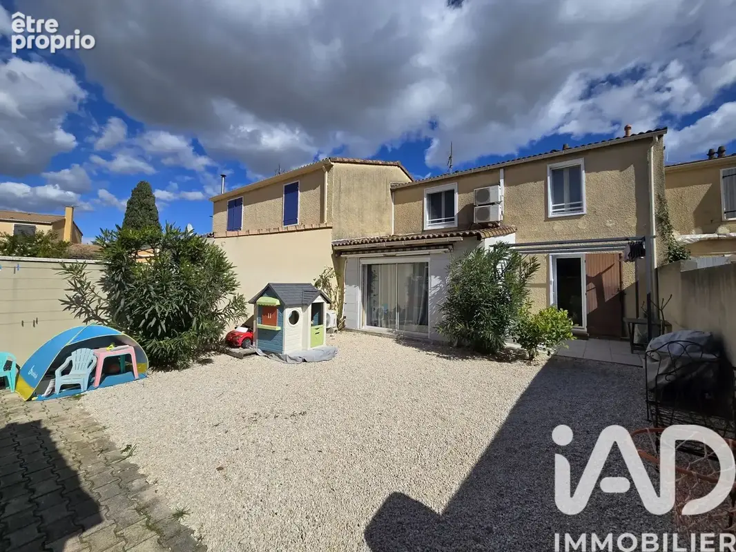 Photo 1 - Maison à LAUDUN-L'ARDOISE