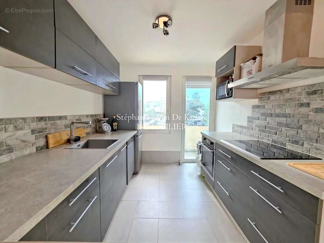 Appartement - 2 chambres -  balcon et parking. - photo 2