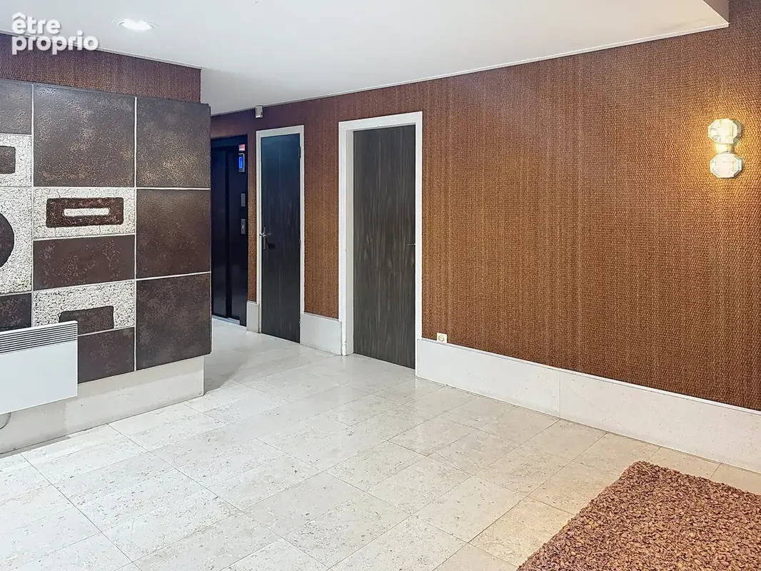 Appartement traversant de 137 m2 ascenseur, balcon terrasse, cave et box - photo 18