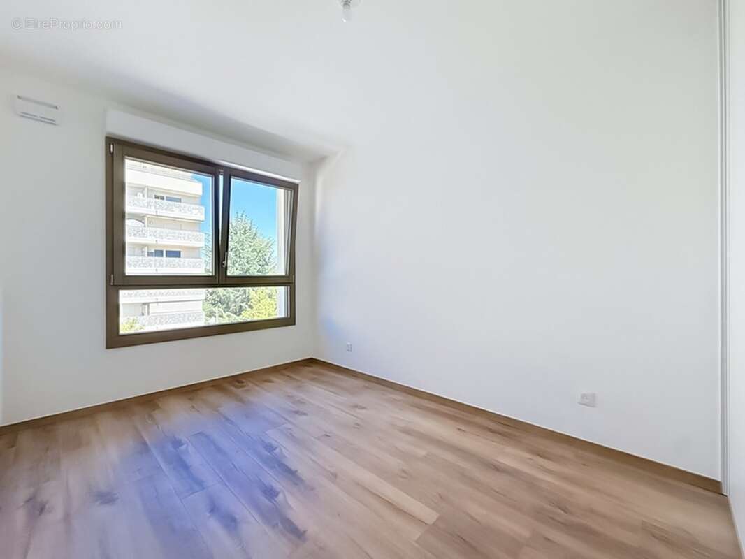 Appartement T5 116 m² dernier étage, terrasse 23 m², 2 garages - ANNECY (74) - photo 10
