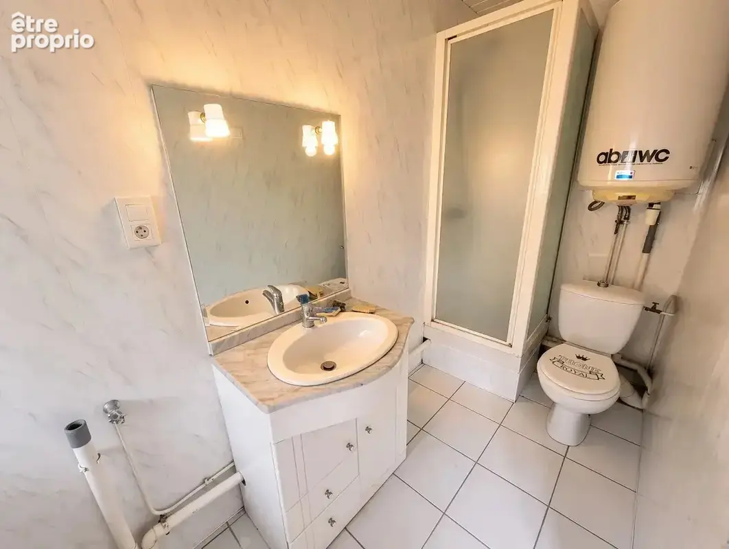 Immeuble zone piétonnière NEVERS très coquet  composé de 6 appartements & 1 local commercial - photo 9