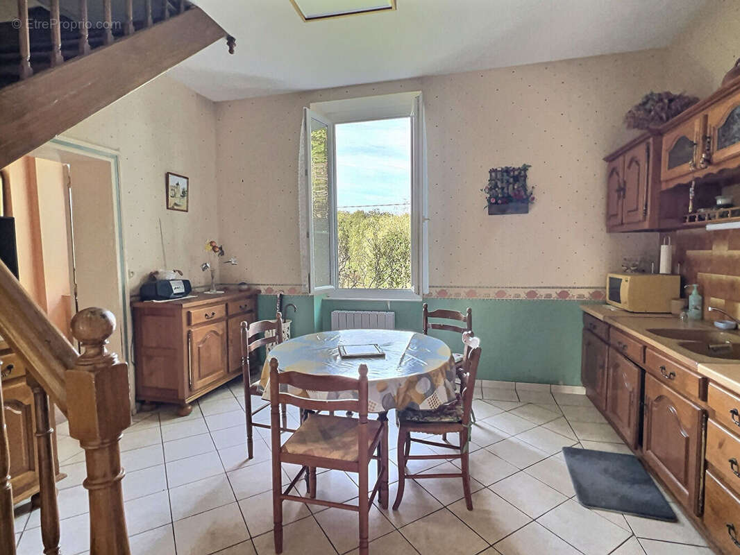 Secteur Villeneuve-sur-Lot, à la campagne mais non isolé, venez découvrir cette charmante maison en pierre de 77,84 m² habitable - photo 4