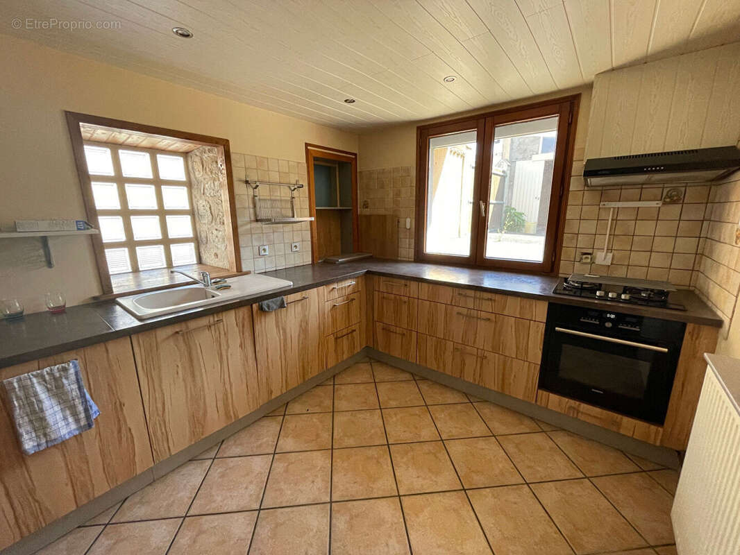 Maison à FONTAINE-LE-COMTE