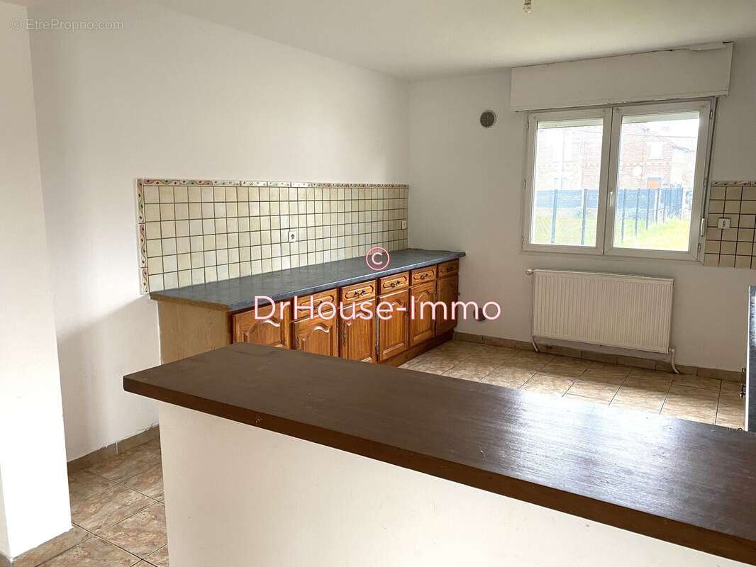 Maison à COURCELLES-LES-LENS