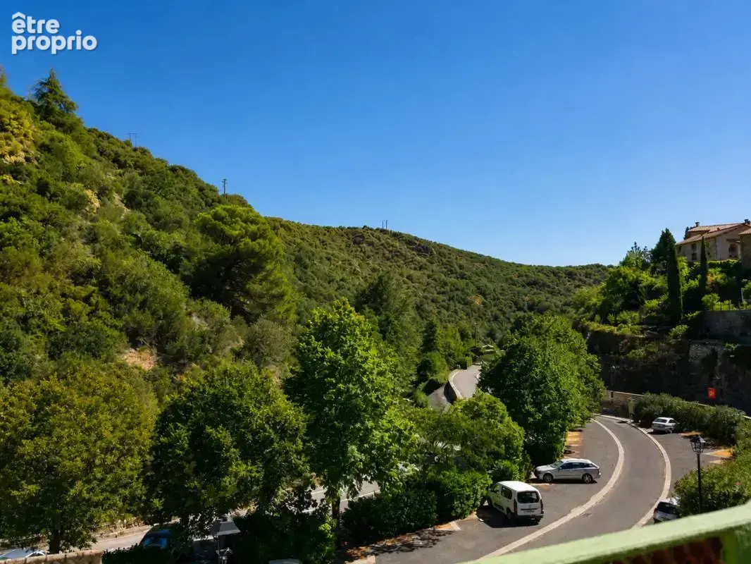Maison de 5 pièces de 126 m² à Lastours avec terrasse et jardinet.
Vue panoramique - photo 14