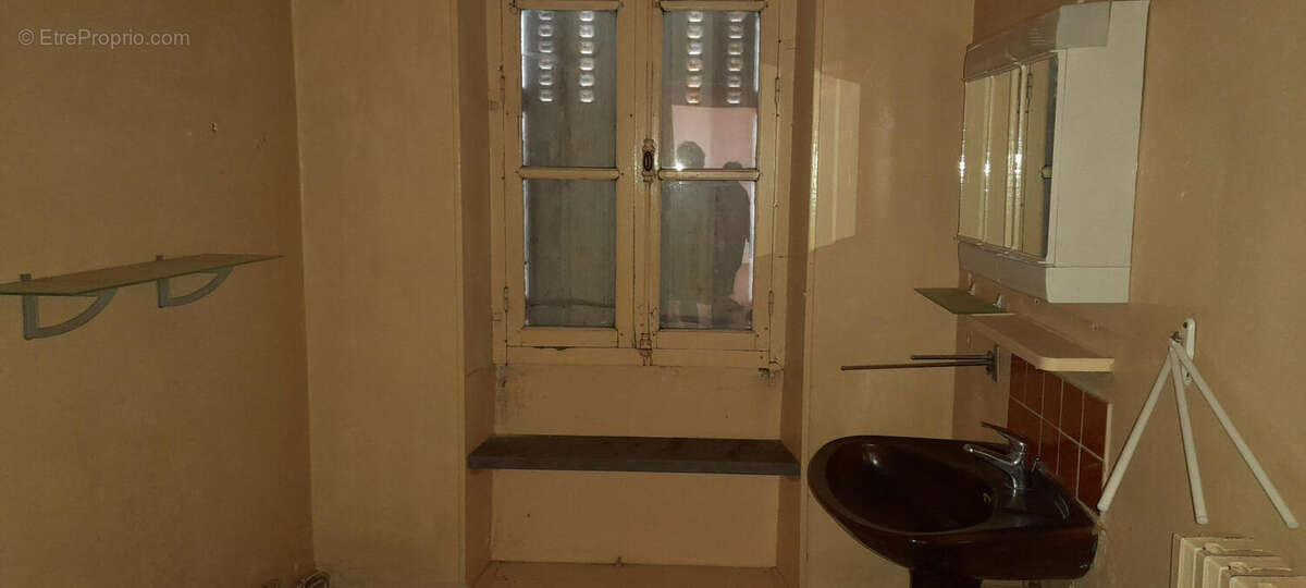 Le salle de bains - Maison à LA COQUILLE