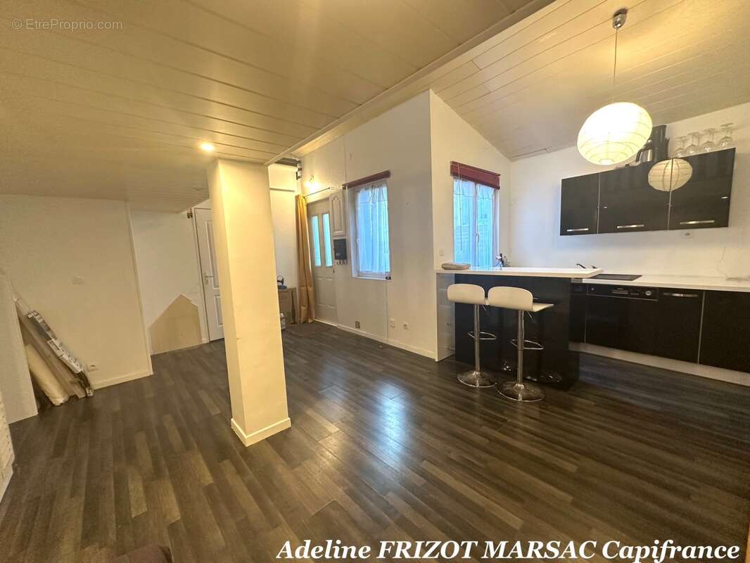 Appartement type maisonnette 54m2- terrasse - 1 chambre - mezzanine - buanderie - cave - photo 3