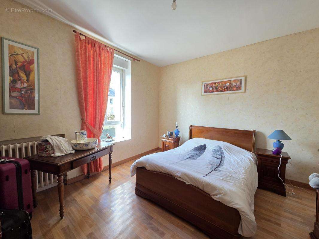 Ensemble immobilier 3 logements-parking- centre bourg neulli - photo 10