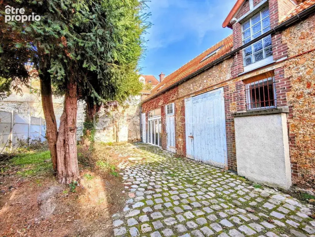 Ensemble immobilier (local commercial + appartement) plein centre ville - photo 8