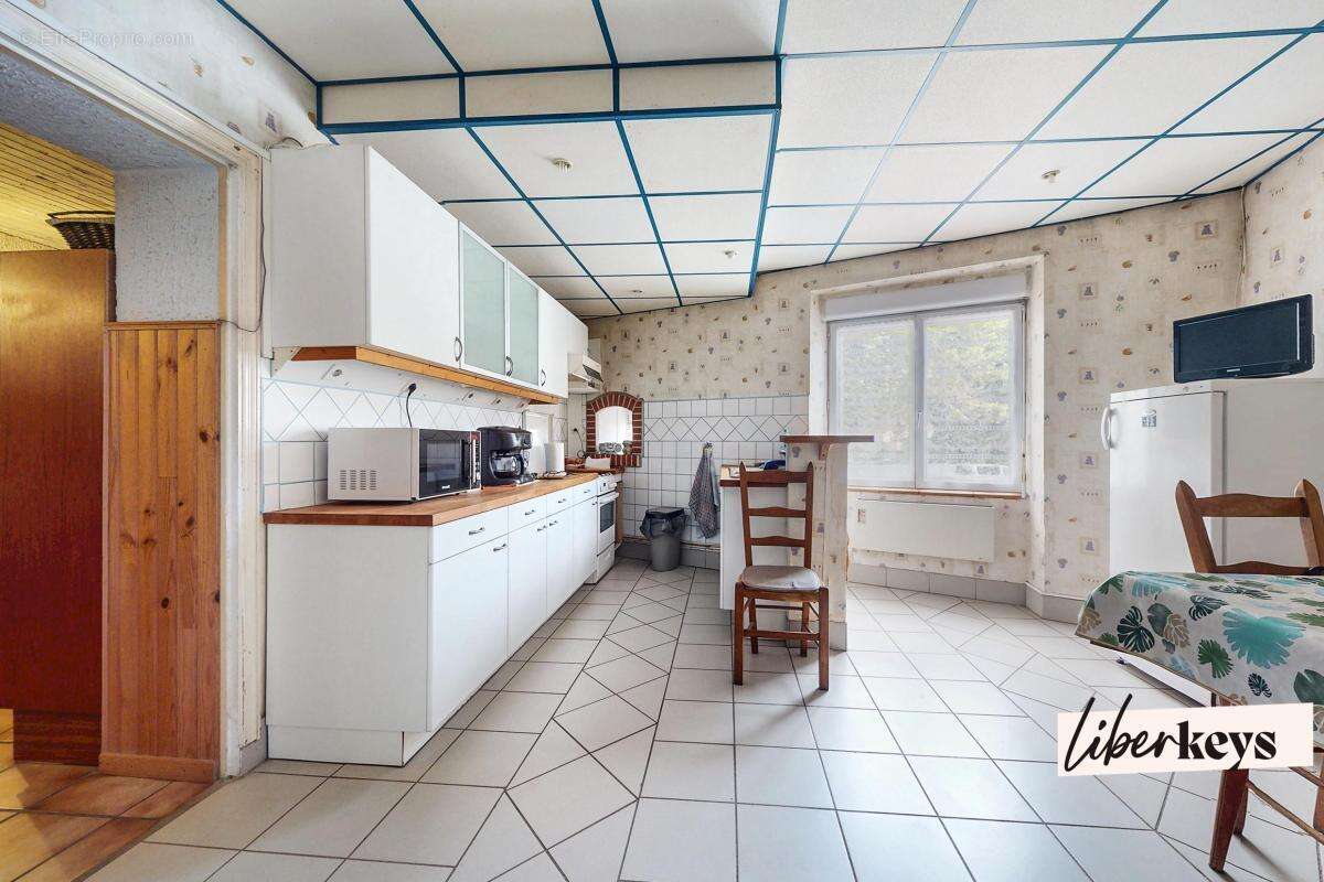 Maison de ville + commerce - photo 2