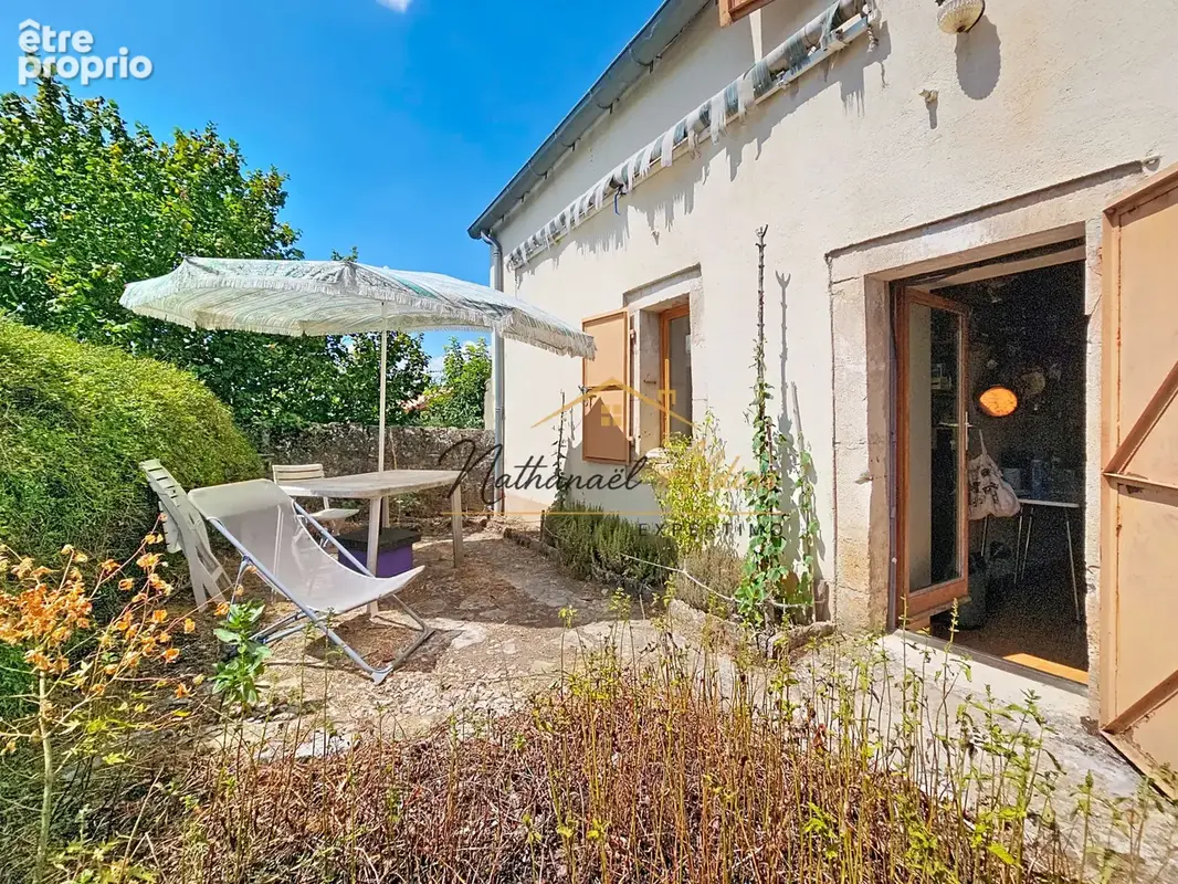 Maison avec terrasse et caves - photo 5
