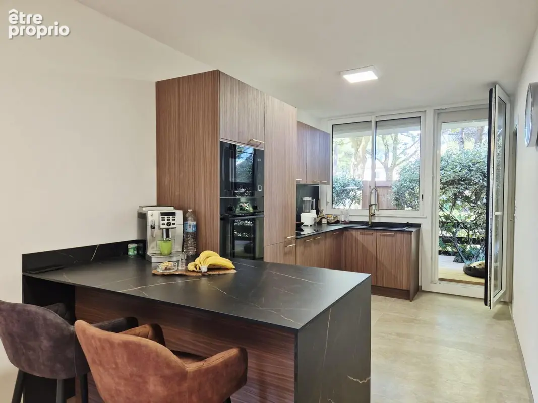 Grand T4 secteur ponant en rez-de-jardin. - photo 3
