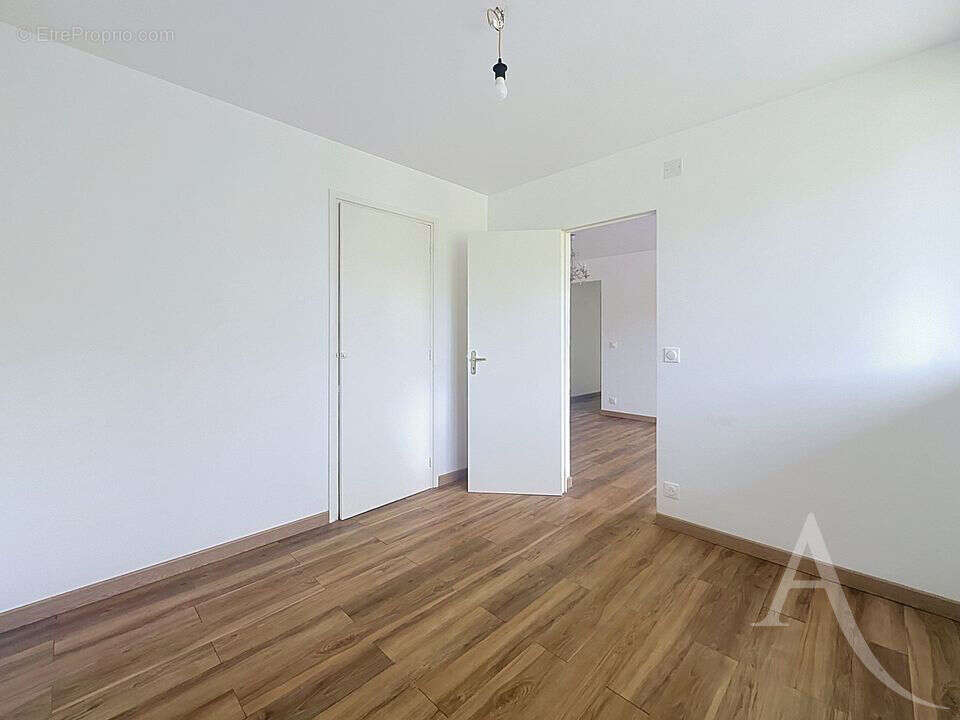 EXCLUSIVITÉ - Appartement F3 56 m² avec balcon, 2 chambres, cave et cuisine équipée - photo 6