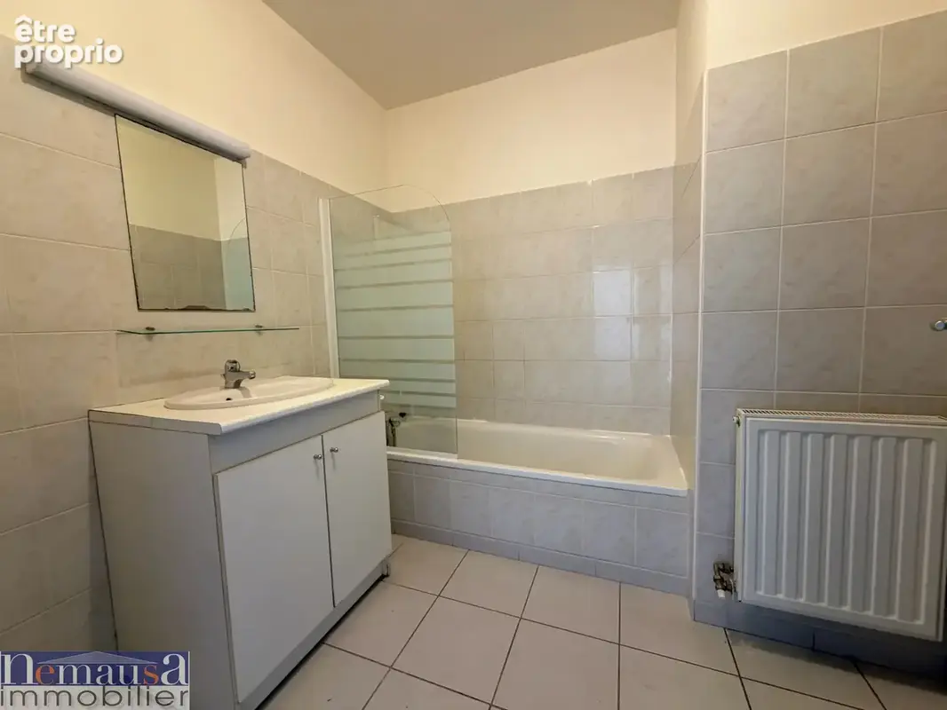 NIMES- Appartement T2 avec place de parking et balcon - photo 4