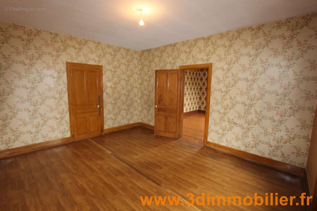 SEJOUR - ETAGE 1 - Maison à CHAMPAGNOLE