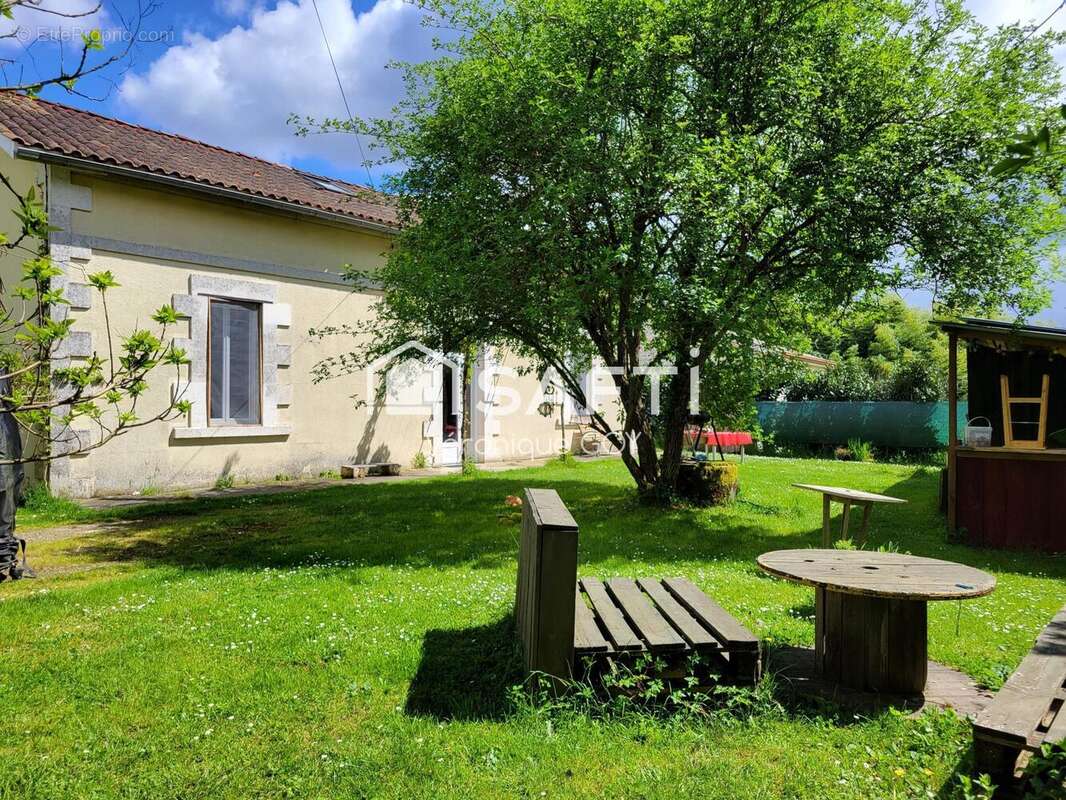 Photo 2 - Maison à SAINT-AIGULIN