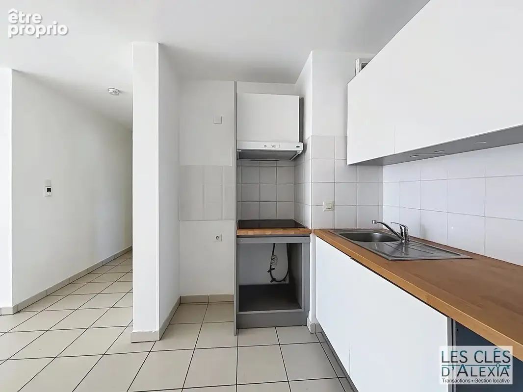 T3 - saint-priest - traversant avec balcon et places de parking - photo 22
