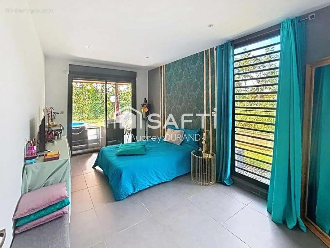 Photo 5 - Maison à REMIRE-MONTJOLY