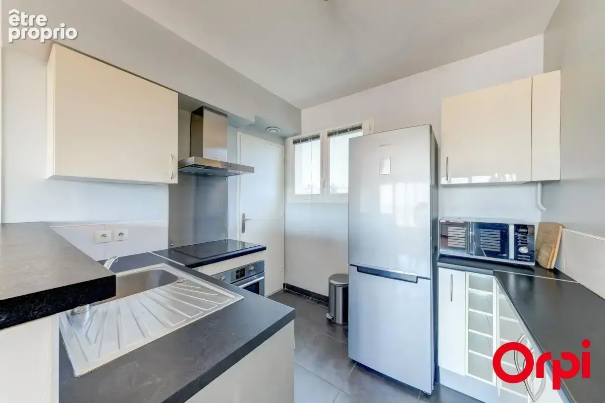 CALUIRE CENTRE BOURG - T3 de 58 m² avec vue dégagée - photo 7