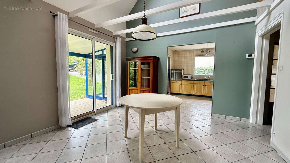 Maison 90 m2 - véranda - terrain de 1100m2 - GUILERS - photo 10