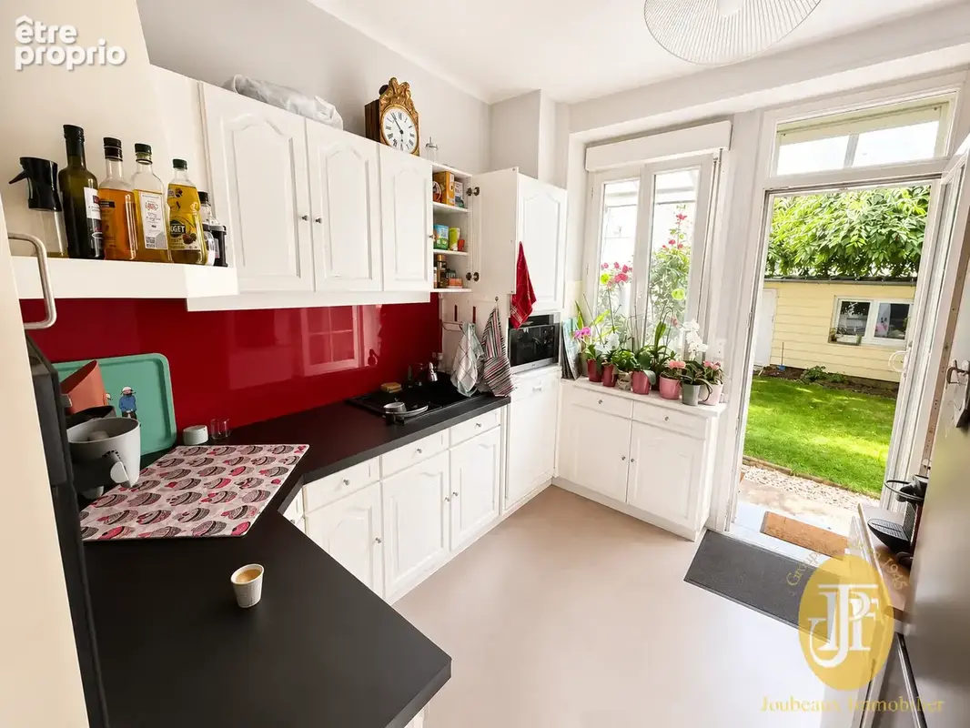 Exceptionnel en plein coeur de ville, maison spacieuse avec jardin - photo 5