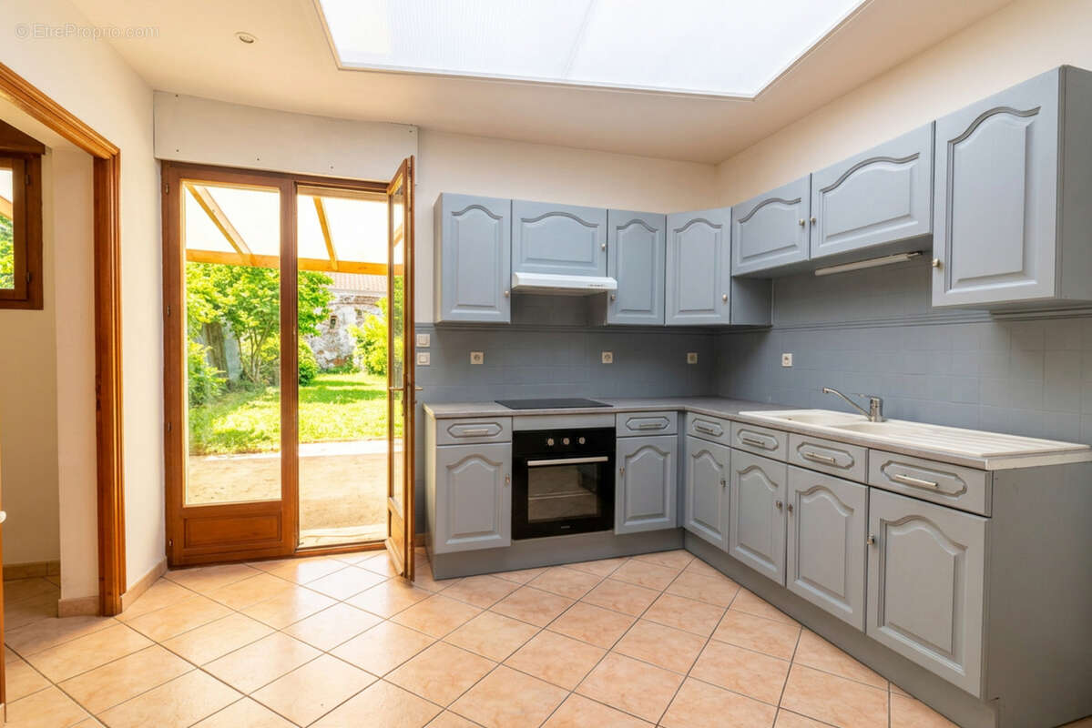 Maison mitoyenne avec jardin 59880 Saint-Saulve - photo 3