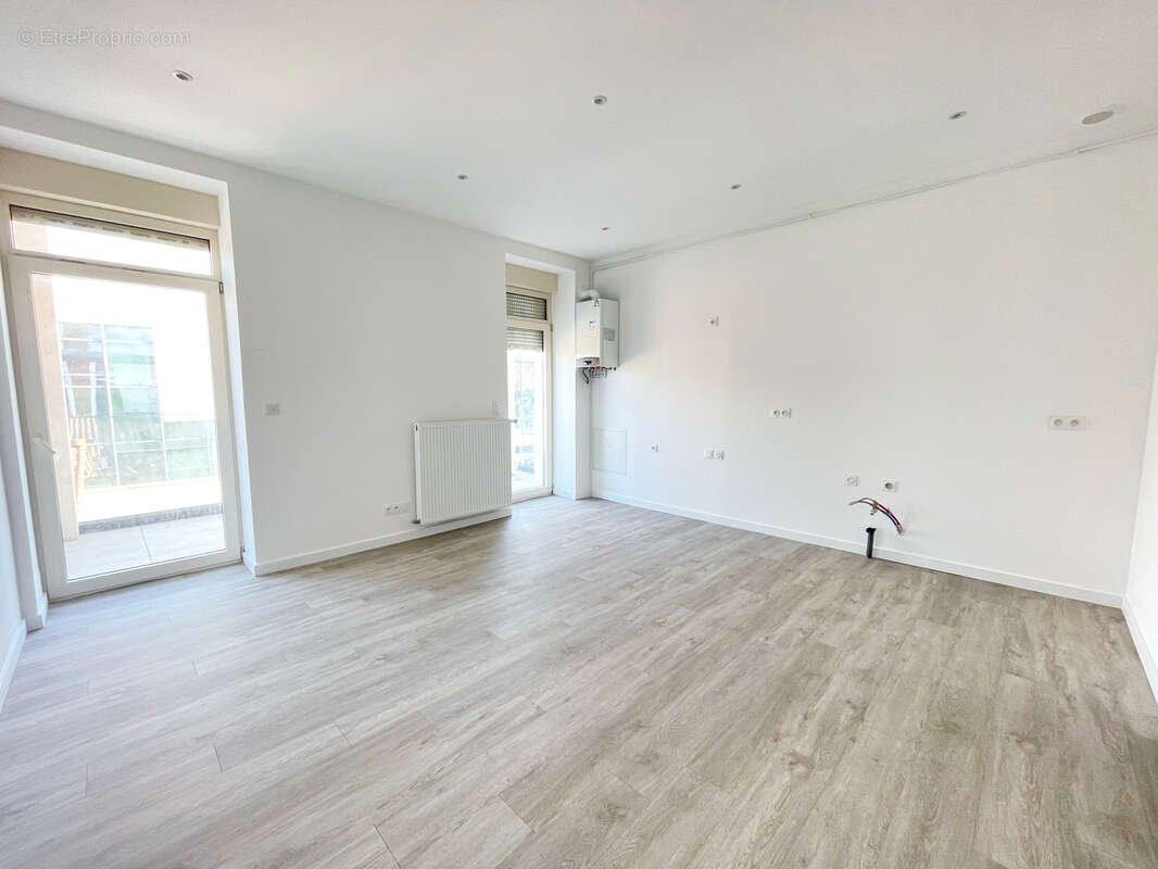 Appartement T2 avec terrasse et stationnement - photo 4