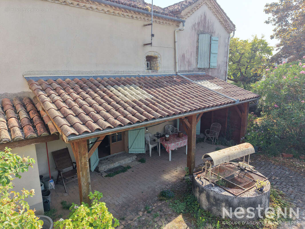 À Vendre Maison en pierre avec jardin, puits et dépendances au coeur du village de Saint-Puy - photo 13