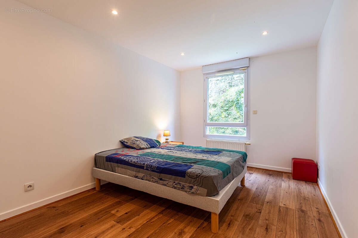 Laforet immobilier - exclusivite - "ficus" - annecy - appartement 4 pieces - 90,36m2 - terrasse - cave - place de stationnement  - photo 9