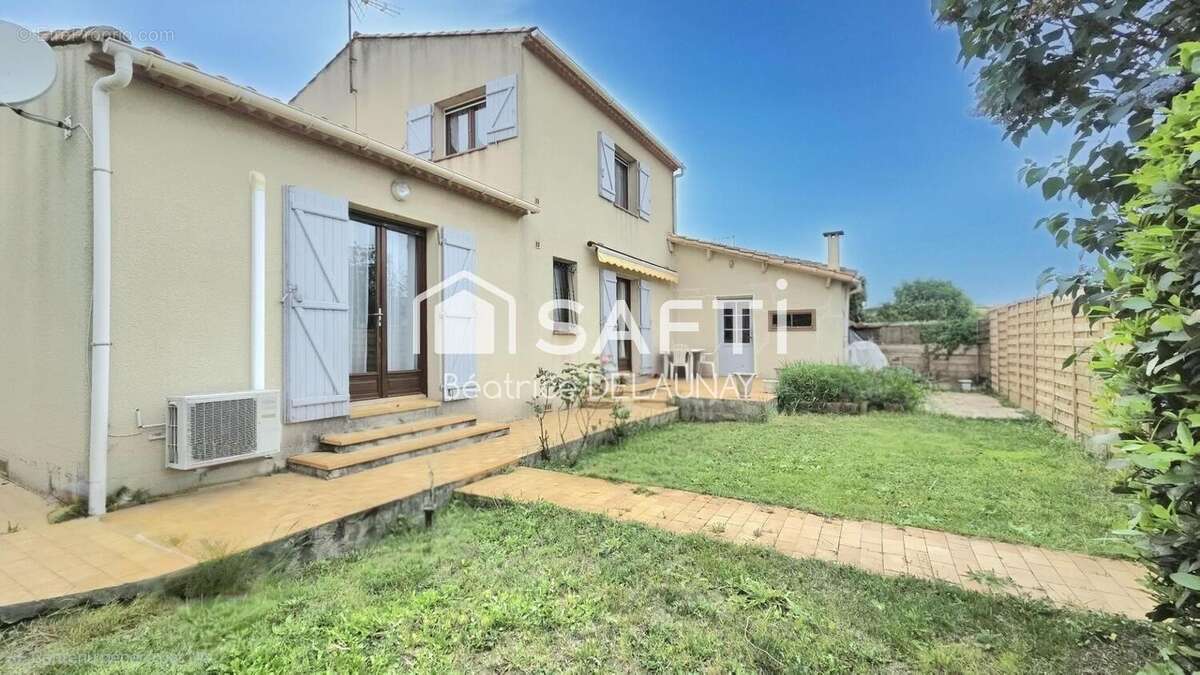 Photo 1 - Maison à SAINT-LAURENT-D'AIGOUZE