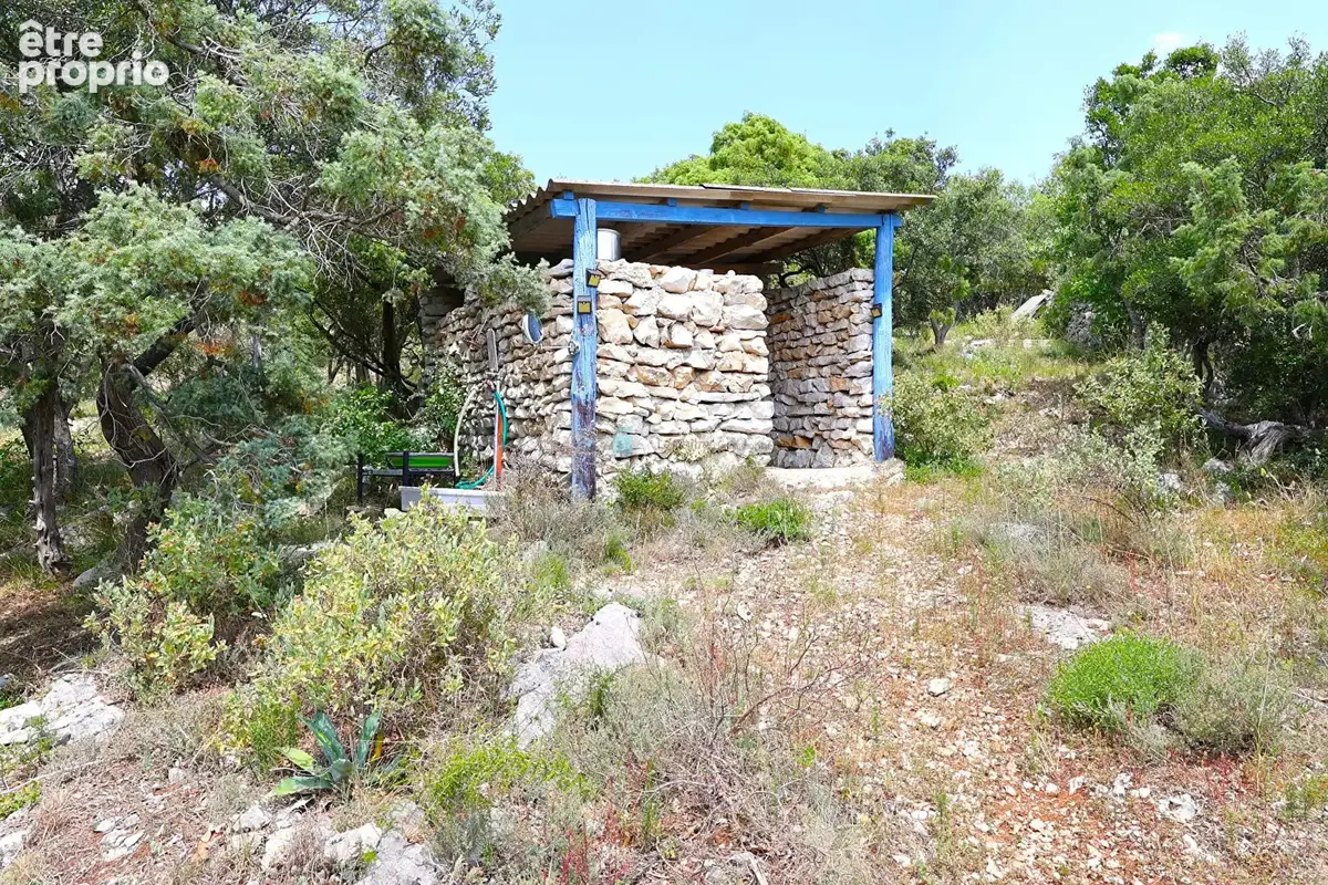 Maison 135 m² avec 2 mazets en pierre et bassin aperçu mer - photo 18