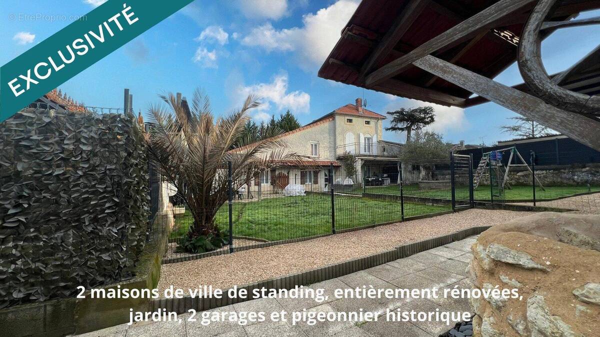 Photo 1 - Maison à VIC-FEZENSAC