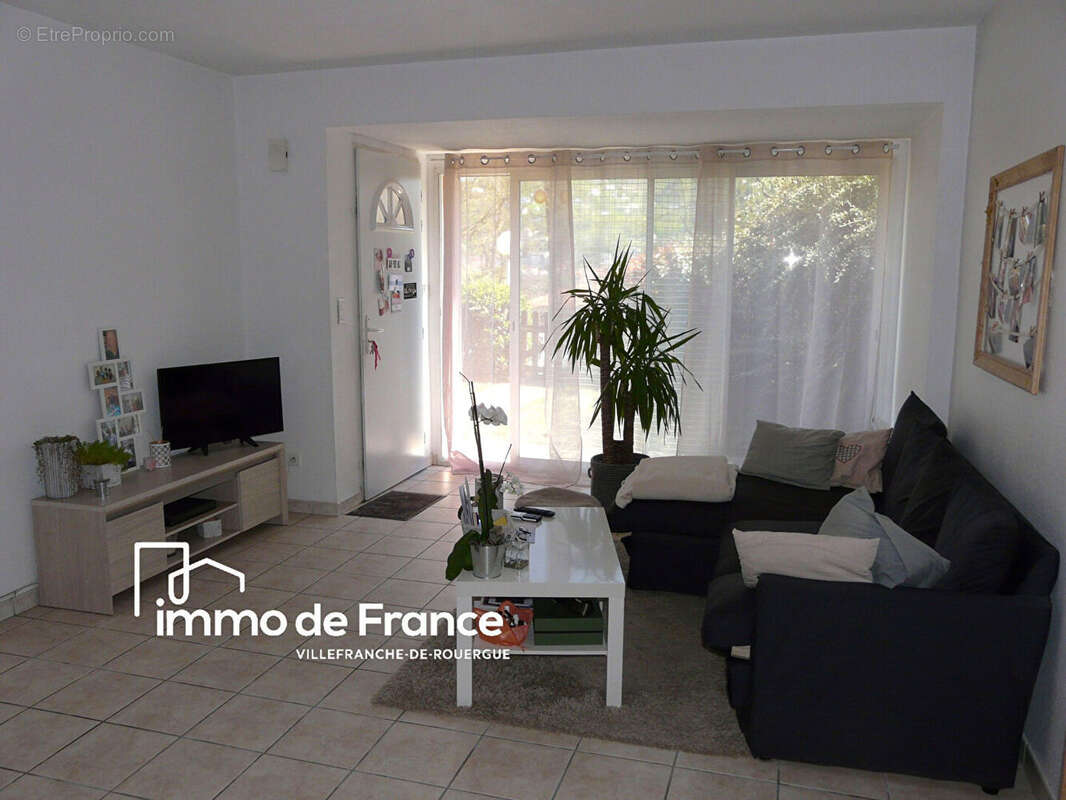 Appartement loué Villefranche De Rouergue 2 pièces, 78 m² avec jardin, garage et parking - photo 3