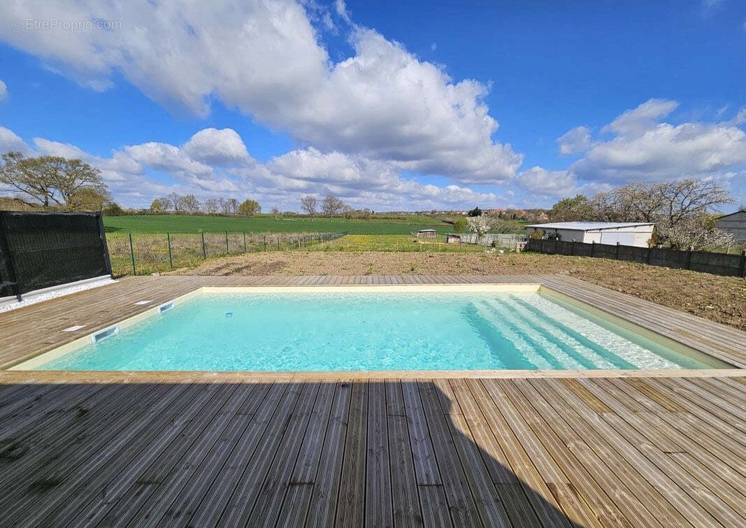 Maison à ESPINASSE-VOZELLE