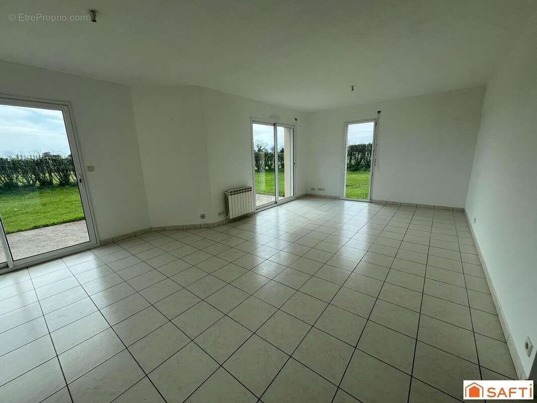 Photo 3 - Maison à LE TREVOUX