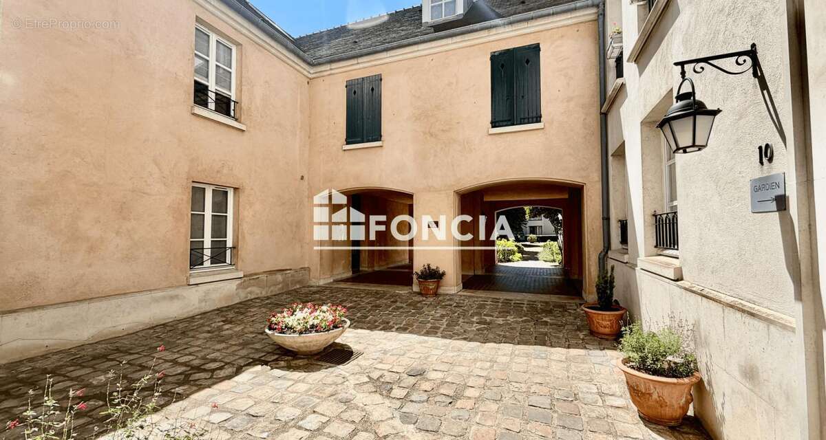 Vente en bloc de 9 parkings sous-sol dans le centre ville - photo 2
