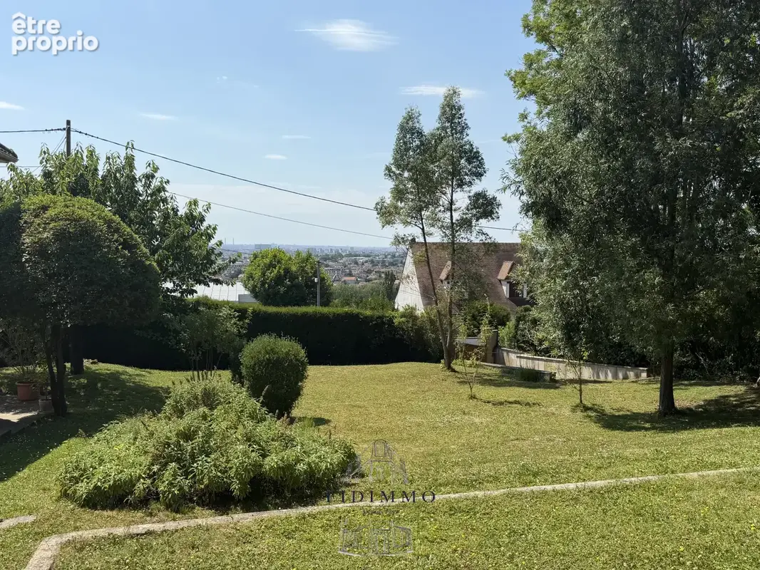 4375 - Terrain constructible avec vue sur Paris - photo 5