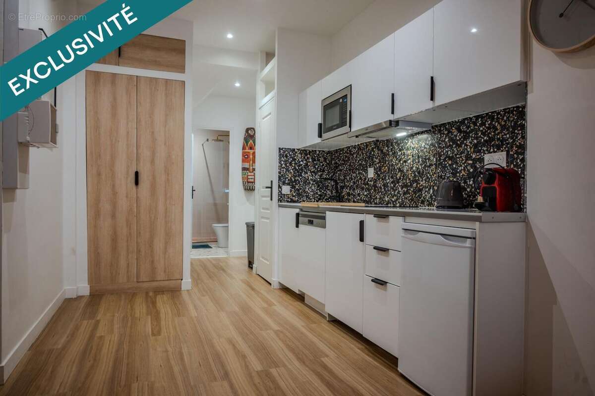 Photo 2 - Commerce à PARIS-18E