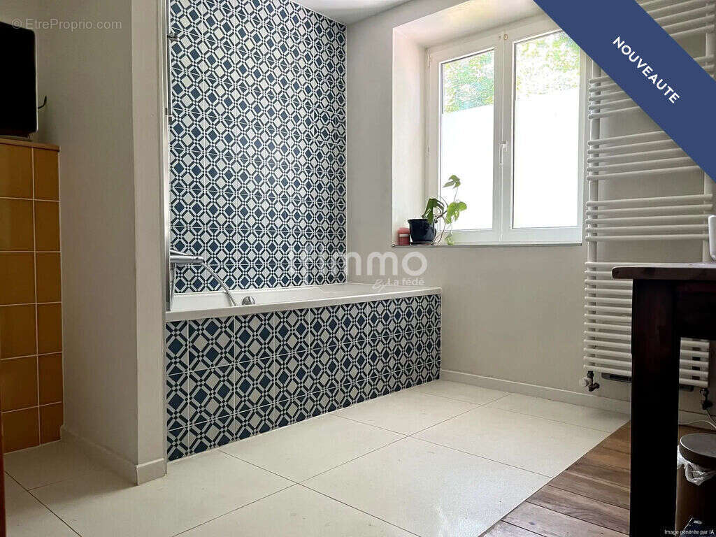 Elégante maison avec deux appartements et une grange - photo 3