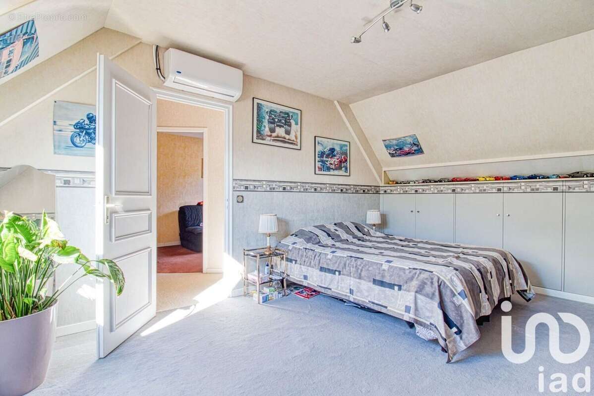 Photo 8 - Maison à CHANTELOUP-LES-VIGNES